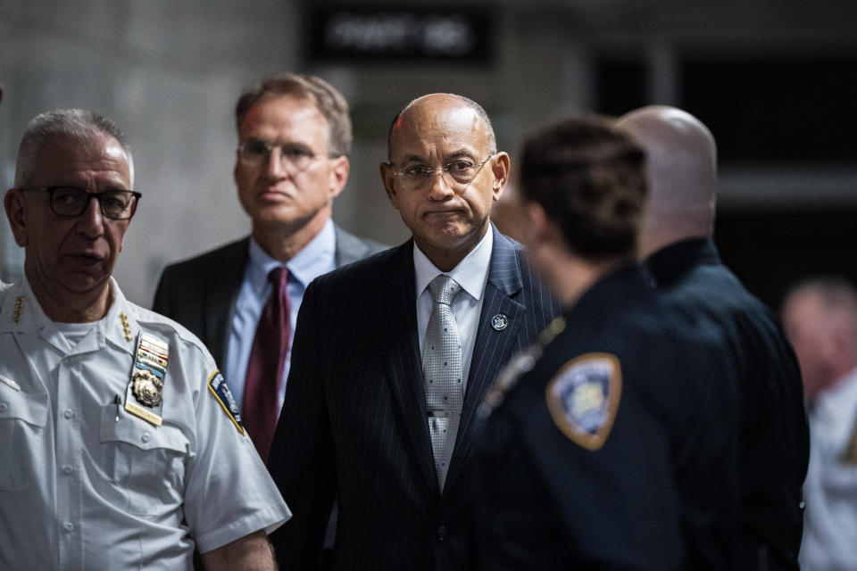 First Deputy Chief Administrative Judge Hon. Norman St. George visits as former President Donald Trump sits in the courtroom at the Manhattan criminal court ahead of jury selection in New York, NY on Monday, April 15, 2024. (Jabin Botsford/Pool Photo via AP)