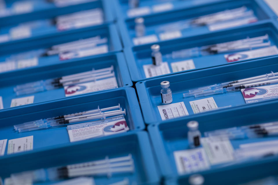 Pfizer-BioNTech COVID-19 vaccines are prepared for administration at the vaccination centre in Gibraltar, Thursday, March 4, 2021. Gibraltar, a densely populated narrow peninsula at the mouth of the Mediterranean Sea, is emerging from a two-month lockdown with the help of a successful vaccination rollout. The British overseas territory is currently on track to complete by the end of March the vaccination of both its residents over age 16 and its vast imported workforce. But the recent easing of restrictions, in what authorities have christened “Operation Freedom,” leaves Gibraltar with the challenge of reopening to a globalized world with unequal access to coronavirus jabs. (AP Photo/Bernat Armangue)