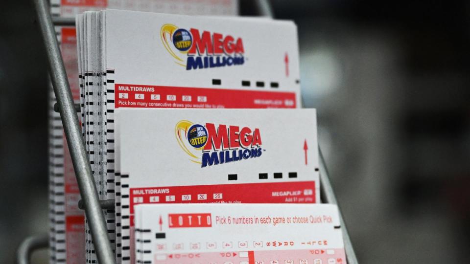 PHOTO: Mega Millions jackpot lottery tickets are seen in a store in New York on August 8, 2023. (Angela Weiss/AFP via Getty Images)