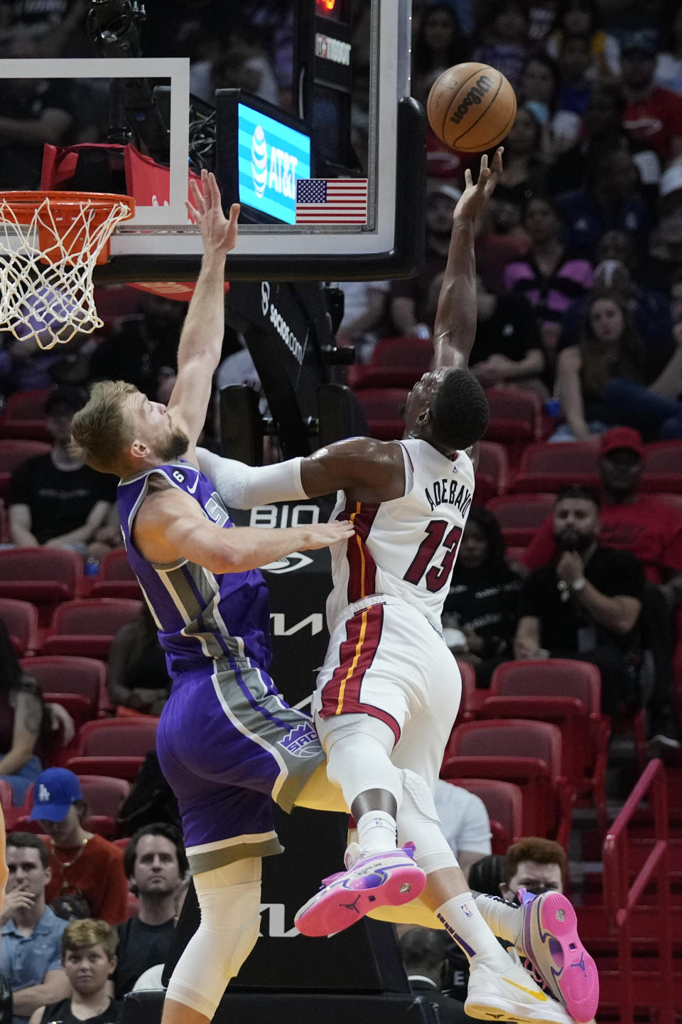 Miami Heat center Bam Adebayo (13) goes up for a shot against Sacramento Kings center Domantas Sabonis (10) during the first half of an NBA basketball game, Wednesday, Nov. 2, 2022, in Miami. (AP Photo/Wilfredo Lee)