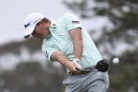 Tom Hoge hits his tee shot on the fifth hole of the South Course at Torrey Pines Golf Course during the final round of the Farmers Insurance golf tournament Sunday, Jan. 26, 2020, in San Diego. (AP Photo/Denis Poroy)