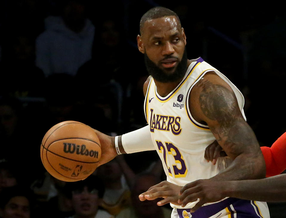 Los Angeles, CA - Lakers star LeBron James handles the ball against the Celtics at Crypto.com Arena in Los Angeles on Christmas Day, Dec. 25, 2023. (Luis Sinco / Los Angeles Times via Getty Images)