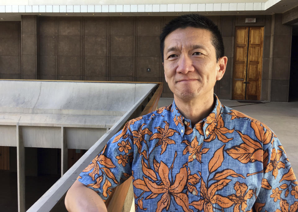 FILE - In this March, 1, 2018, file photo, Hawaii Lt. Gov. Doug Chin poses for a photo in Honolulu. Chin is campaigning for the U.S. congressional seat representing urban Honolulu. Hawaii voters head to the polls this weekend for a primary election that will most likely settle the outcome of this year's major races. That's because the Democratic Party continues to overwhelmingly dominate Hawaii politics. (AP Photo/Audrey McAvoy, File)