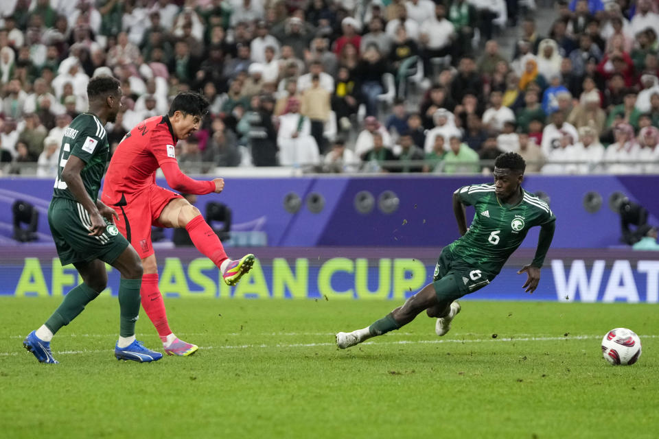 South Korea's Son Heung-Min, second left, kicks the ball during the Asian Cup Round of 16 soccer match between Saudi Arabia and South Korea, at the Education City Stadium in Al Rayyan, Qatar, Tuesday, Jan. 30, 2024. (AP Photo/Thanassis Stavrakis)