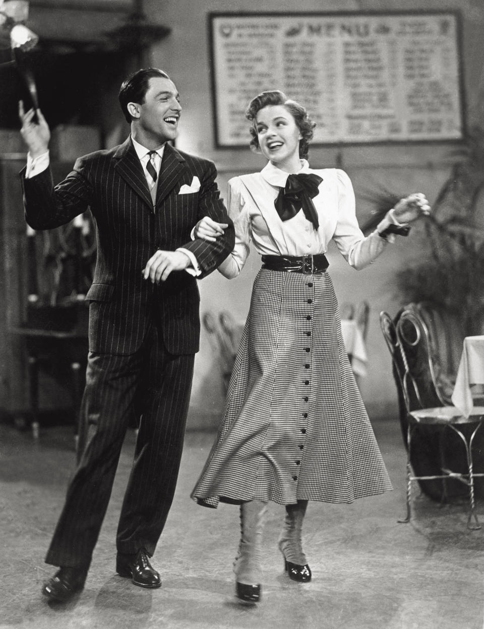 The American actor and dancer Gene Kelly dances with Garland in the 1942 film "For Me and My Gal."&nbsp;