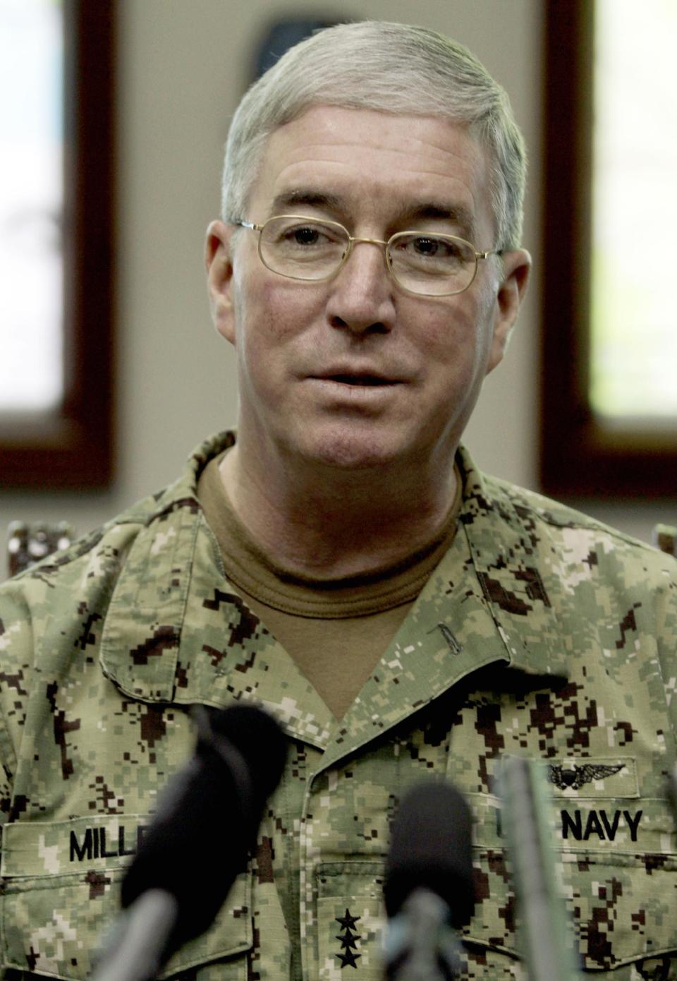 U.S. Navy Vice Adm. John Miller briefs journalists at the U.S. Navy base in Manama, Bahrain, on Thursday, Sept. 20, 2012, about a major exercise involving air, sea and undersea forces from more than 20 nations responding to simulated sea-mine attacks in international waters. The sea maneuvers, a demonstration of international resolve to ensure maritime security, are being held in the Persian Gulf, the Gulf of Oman and the Gulf of Aden. (AP Photo/Hasan Jamali)