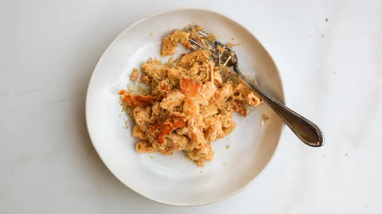 macaroni cheese plate with fork