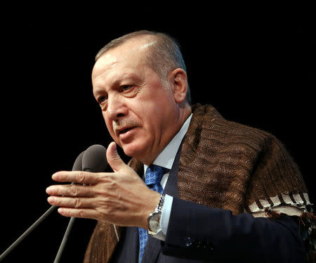Turkish President Tayyip Erdogan makes a speech during a meeting in Ankara Turkey March 21, 2018. Kayhan Ozer/Presidential Palace/Handout via REUTERS