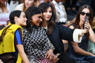 <p>Mindy Kaling and Gemma Chan take a selfie at the Tory Burch Spring/Summer 2022 show during New York Fashion Week on Sept. 12.</p>