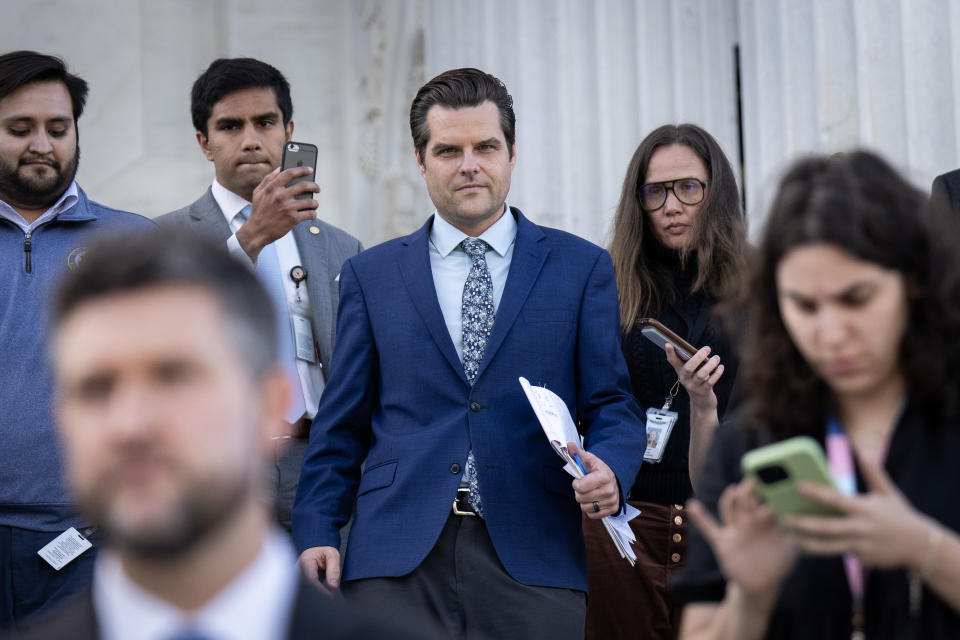 Rep. Matt Gaetz amid reporters.