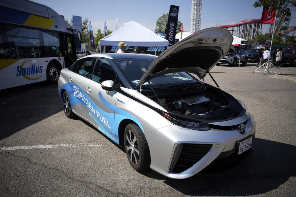 FILE - A 2021 Toyota Prius that runs on a hydrogen fuel cell sits on display at the Denver auto show Sept. 17, 2021, at Elitch's Gardens in downtown Denver. As fossil fuel emissions continue warming Earth’s atmosphere, the Biden administration is turning to hydrogen as an energy source for vehicles, manufacturing and generating electricity. (AP Photo/David Zalubowski, File)