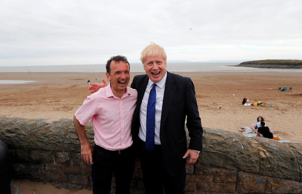 Conservative party leadership candidate Boris Johnson and Alun Cairns, Secretary of State in Wales pose for a photograph, before a hustings event with leadership rival Jeremy Hunt in Cardiff, Britain July 6, 2019. Frank Augstein/Pool via REUTERS