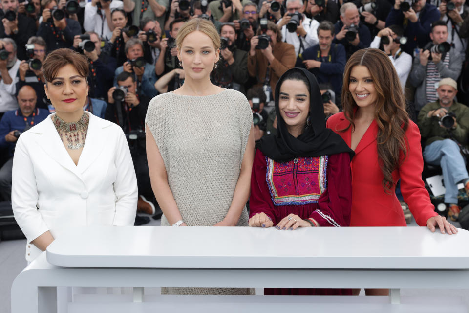 Rubina Qureshi, Jennifer Lawrence, Maha Ali, and Sabrina Harper pose together at a media event