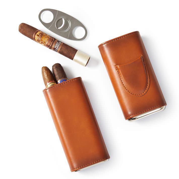 <p><a href="https://go.redirectingat.com?id=74968X1596630&url=https%3A%2F%2Fwww.markandgraham.com%2Fproducts%2Fleather-cigar-case%2F%3Fpkey%3Dcmonogrammed-golf-gifts&sref=https%3A%2F%2Fwww.menshealth.com%2Ftechnology-gear%2Fg27207975%2Fbest-golf-gifts%2F" rel="nofollow noopener" target="_blank" data-ylk="slk:Shop Now;elm:context_link;itc:0;sec:content-canvas" class="link ">Shop Now</a></p><p>Leather Cigar Case</p><p>markandgraham.com</p><p>$99.00</p>