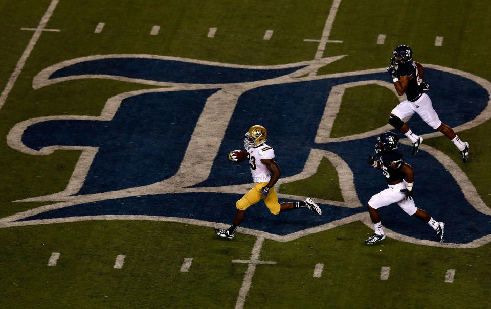 Johnathan Franklin #23 of the UCLA Bruins runs for a 78 yard touchdown in the second quarter of the game against the Rice Owls at Rice Stadium on August 30, 2012 in Houston, Texas. (Photo by Scott Halleran/Getty Images)