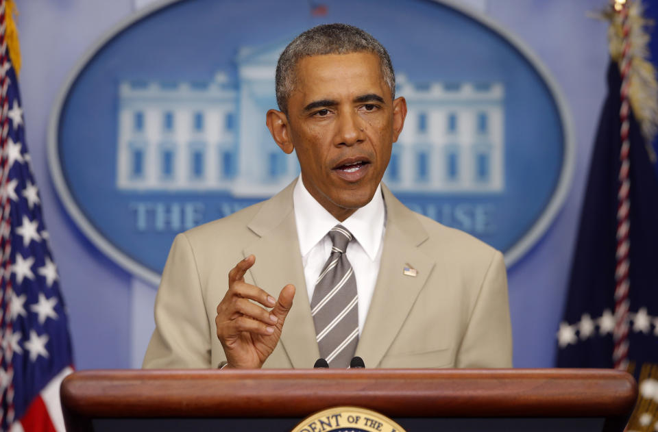 President Barack Obama speaks the economy, Iraq, and Ukraine, Thursday, Aug. 28, 2014, in the James Brady Press Briefing Room of the White House in Washington, before convening a meeting with his national security team on the militant threat in Syria and Iraq. (AP Photo/Charles Dharapak)