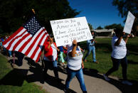 <p>People protest against the Trump administration’s policy of separating immigrant families suspected of illegal entry, in El Paso, Texas, June 19, 2018. (Photo: Mike Blake/Reuters) </p>