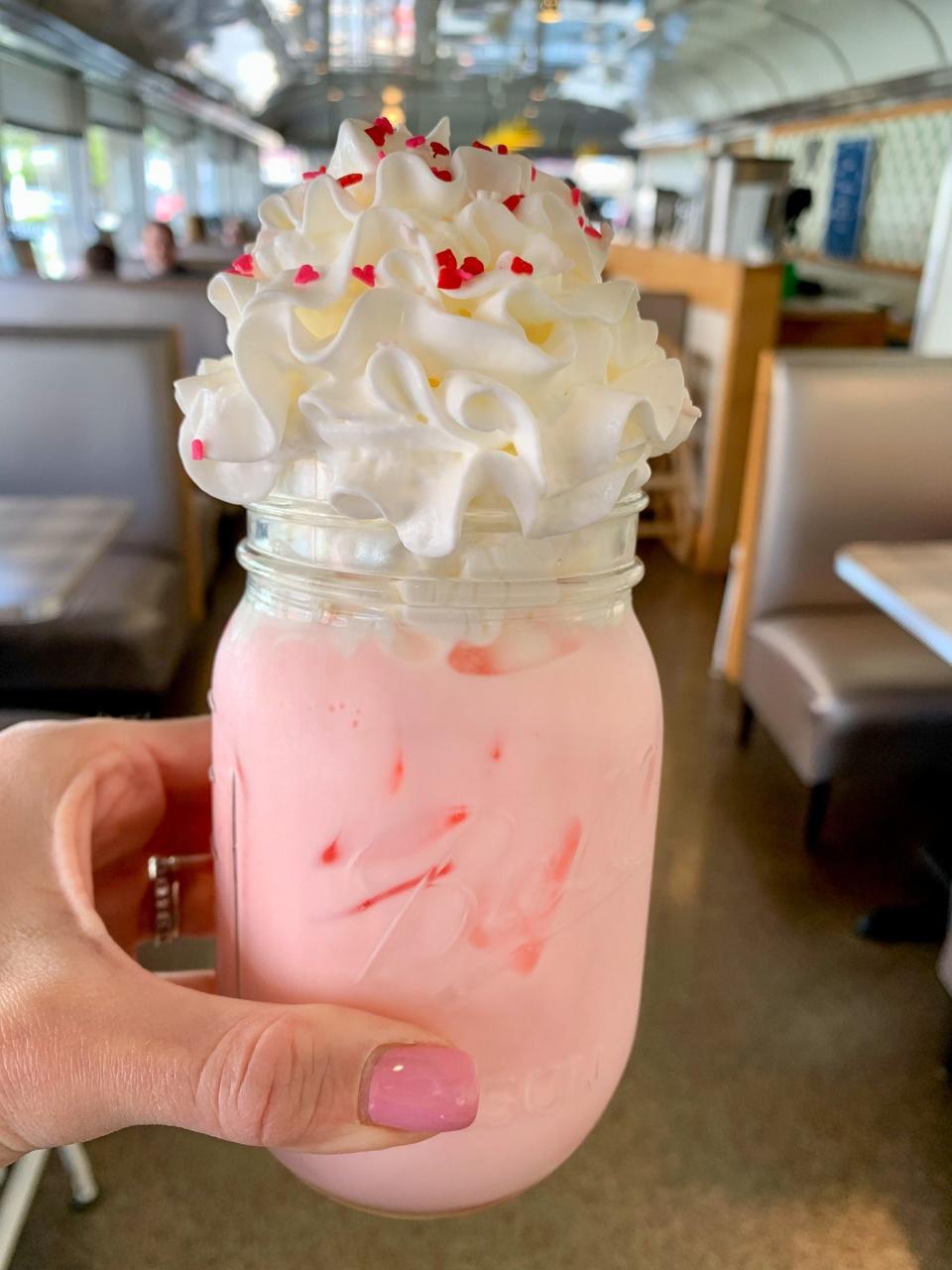 A Unicorn Tears drink, with strawberry vanilla milk, whipped cream and heart-shaped sprinkles, from Toast in Red Bank and Asbury Park.
