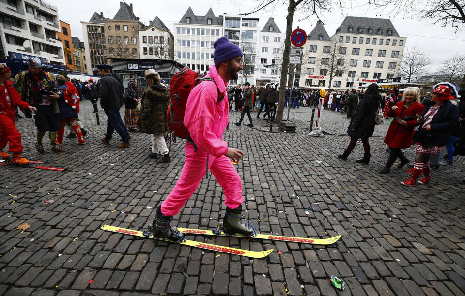 <p>Carnival revellers celebrate during “Weiberfastnacht” (Women’s Carnival) in Cologne, Germany on Feb. 23, 2017, marking the start of a week of street festivals with the highlight “Rosenmontag”, Rose Monday processions. (Photo: Wolfgang Rattay/Reuters) </p>