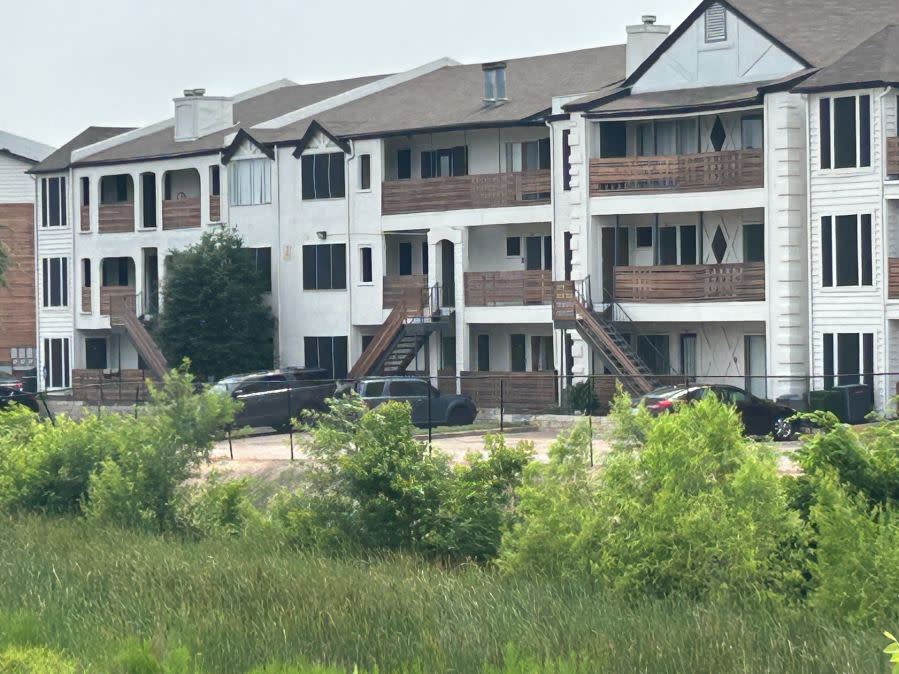 Authorities search the area near Matthew Torres’ apartment, where he was shot and killed on May 17, 2024. (KXAN Photo/Frank Martinez)