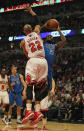 CHICAGO, IL - APRIL 21: Ian Mahinmi #28 of the Dallas Mavericks tries to shoot and is fouled by Taj Gibson #22 of the Chicago Bulls at the United Center on April 21, 2012 in Chicago, Illinois. NOTE TO USER: User expressly acknowledges and agress that, by downloading and/or using this photograph, User is consenting to the terms and conditions of the Getty Images License Agreement. (Photo by Jonathan Daniel/Getty Images)