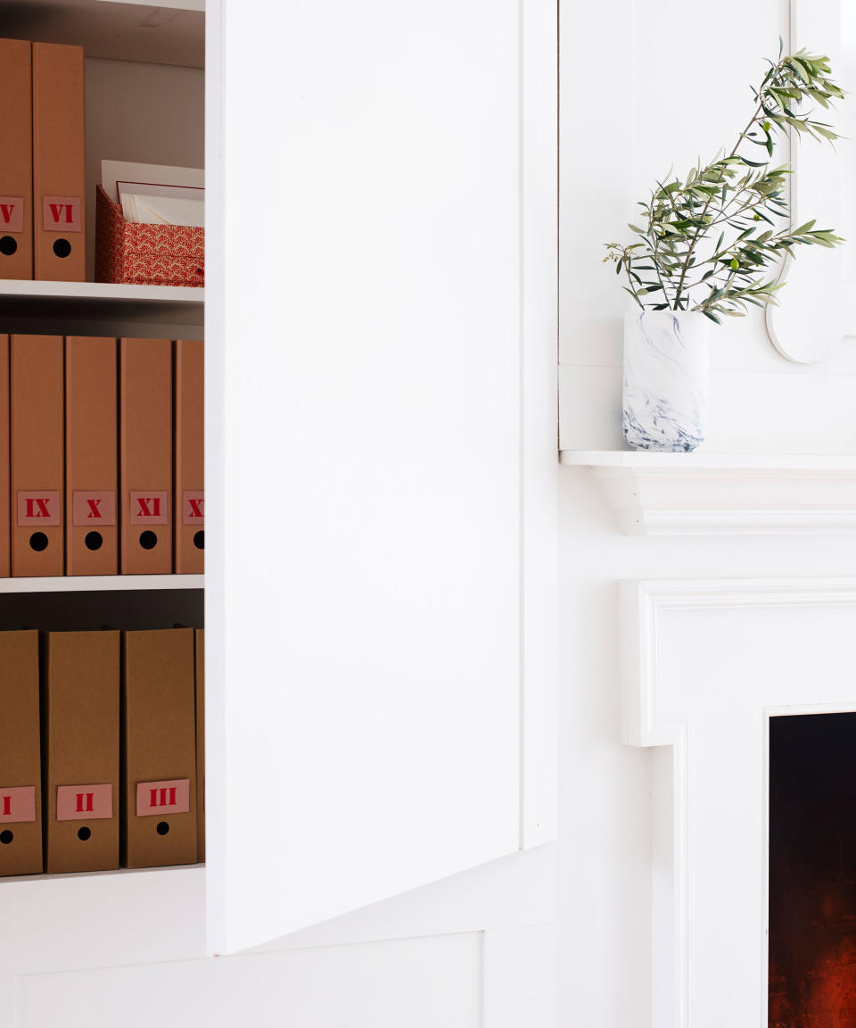 brown folders in closet