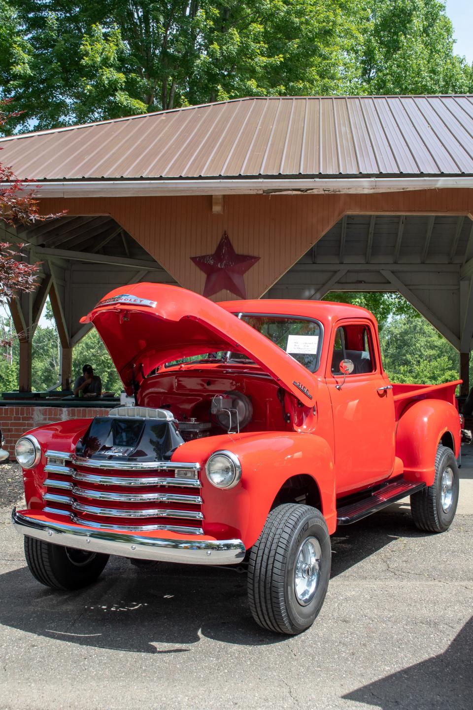 Parked just outside of the large pavilion, a 1953 Chevy 4x4 3100 owned by Ron and Stephanie Bourquin of Zoar is on display at the Byesville Firemen's Festival car show.