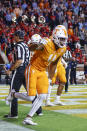 Tennessee wide receiver Cedric Tillman (4) celebrates his touchdown during the first half of the team's NCAA college football game against Mississippi on Saturday, Oct. 16, 2021, in Knoxville, Tenn. (AP Photo/Wade Payne)