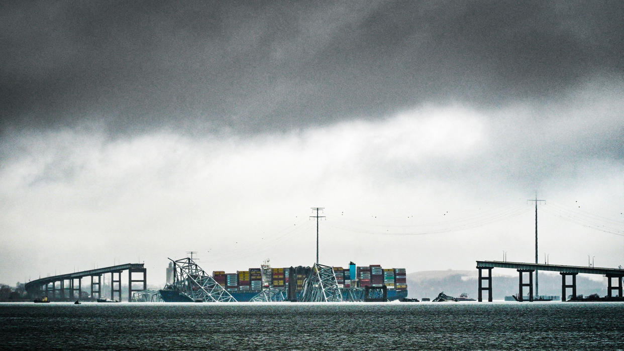  The Dali, a Singaporean-flagged cargo vessel that spans the size of almost three football fields, remains stuck under debris from the Francis Scott Key Bridge. 