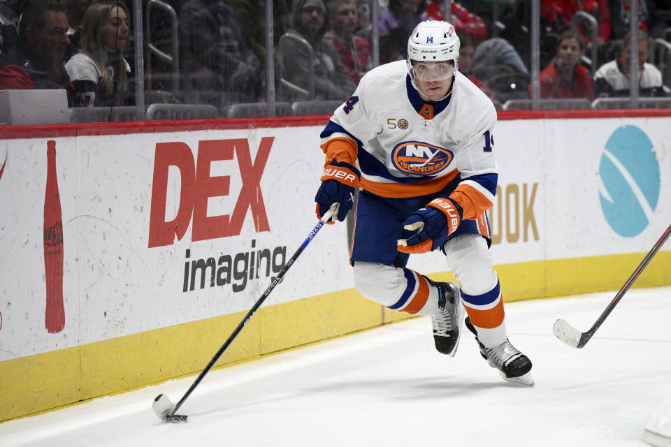 FILE - New York Islanders center Bo Horvat (14) plays during the first period of an NHL hockey game against the Washington Capitals, Monday, April 10, 2023, in Washington. The Islanders open their season against Buffalo on Oct. 14. (AP Photo/Nick Wass, File)