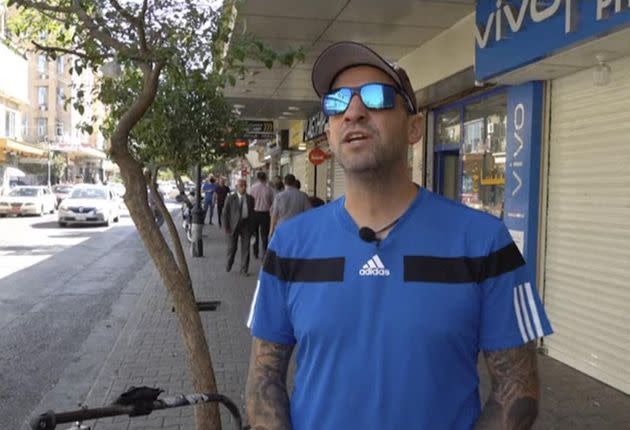 In this frame grab from video, 41-year-old Santiago Sánchez, a Spanish man who was documenting his travel by foot from Madrid to Doha for the 2022 FIFA World Cup, speaks to the Associated Press on a street, in Sulaymaniyah, Iraq, on Sept. 28. (Photo: Associated Press)