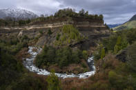 The Truful Truful River winds through Conguillio National Park near Melipeuco, southern Chile, on Monday, July 11, 2022. For the Mapuche, Chile's largest Indigenous group and more than 10 percent of its population, a pristine river like the Truful Truful, flowing from a lava field under an Andean volcano, is the home of a spiritual force to revere, not a natural resource to exploit. (AP Photo/Rodrigo Abd)