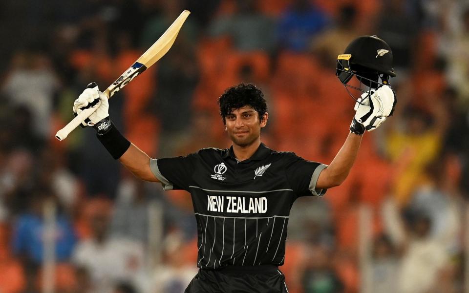 Rachin Ravindra of New Zealand celebrates his century