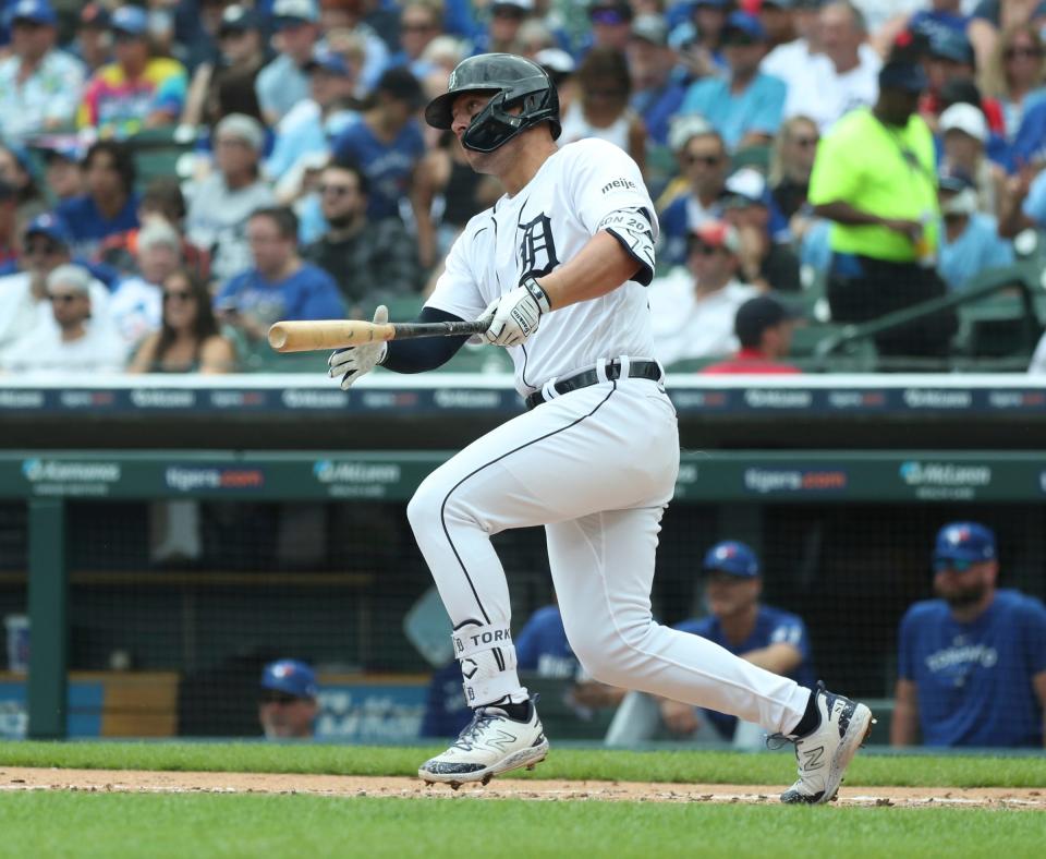 Detroit Tigers first baseman Spencer Torkelson (20) doubles against Toronto Blue Jays starting pitcher Chris Bassitt (40) during first-inning action at Comerica Park in Detroit on Sunday, July 9, 2023.
