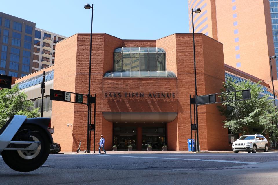 Picture the facade of the former Saks building punctuated with oversized windows.