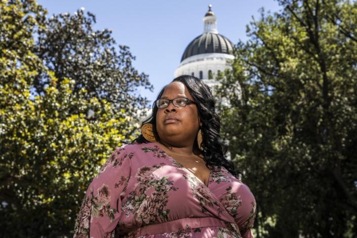 Kolieka Seigle, president of the California National Organization for Women who is advocating for legislation to punish marital rape the same as other types of rape, stands for a portrait near the California State Capitol in Sacramento, Calif. on Tuesday, May 11, 2021. (Stephen Lam / San Francisco Chronicle)