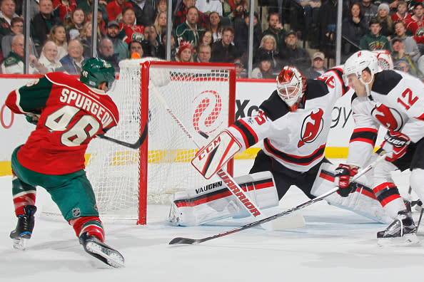 ST. PAUL, MN - JANUARY 17: Jared Spurgeon #46 of the Minnesota Wild scores a goal against Ben Lovejoy #12 and goalie Cory Schneider #35 of the New Jersey Devils during the game on January 17, 2017 at the Xcel Energy Center in St. Paul, Minnesota. (Photo by Bruce Kluckhohn/NHLI via Getty Images)