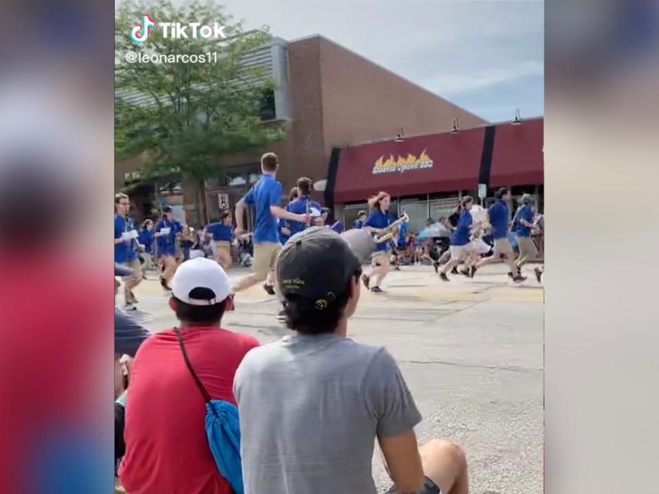 Tiktok video shows people running after shots rang out at a Highland Park Fourth of July parade.