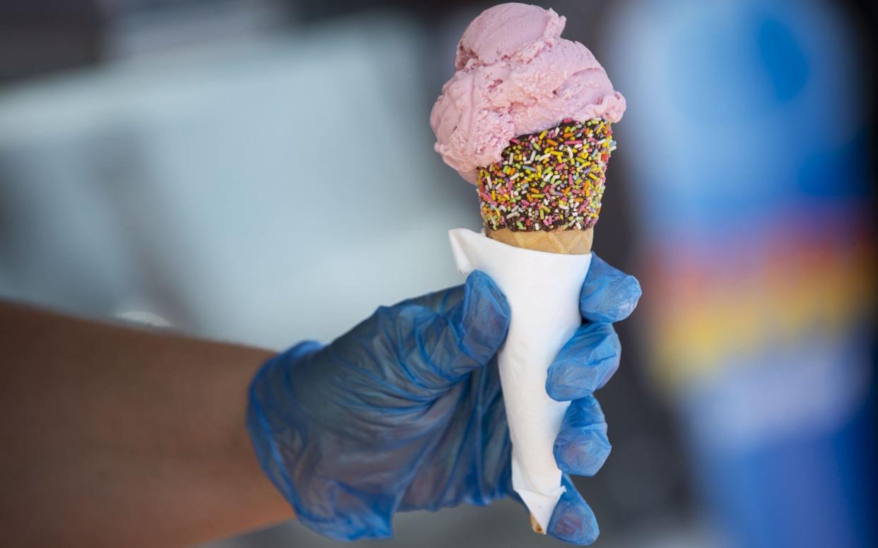 Picture 234851636 11/07/2020 at 13:56 Owner : Getty Contributor BARRY, WALES - JULY 11: A ice cream is served by a woman wearing blue surgical gloves at Whitmore Bay at Barry Island on July 11, 2020 in Barry, Wales. Large parts of Wales' visitor, hospitality, leisure and tourism industries will re-open over the next three weeks. (Photo by Matthew Horwood/Getty Images) Cost Indicator No Cost Owner Getty Contributor Properties rgb, JPEG, 1.8M (39.9M), 4453w x 3135h, 96 x 96 dpi Feed name GettyCont Headline Wales Ready To Welcome Back Visitors Keywords FIN, HTH, HUM, LIF, TRV, human interest, business finance and industry, lifestyles, travel, coronavirus, covid-19, infectious disease, uk, 2020, outdoors, leisure activity, business, industry, barry island, wales, tourism, weather, sun, beach, coastline, sea, obscured face, close-up, hot weather, one person, part of, I Photographer Matthew Horwood Photographer title Contributor Copyright Getty Images Europe Provider Getty Images - Matthew Horwood /Getty Images