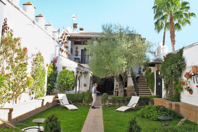 <p>Courtesy of Catherine Buni</p> A courtyard at Hotel La Malvasí­a, in El Rocí­o, on the outskirts of Doñana National Park.