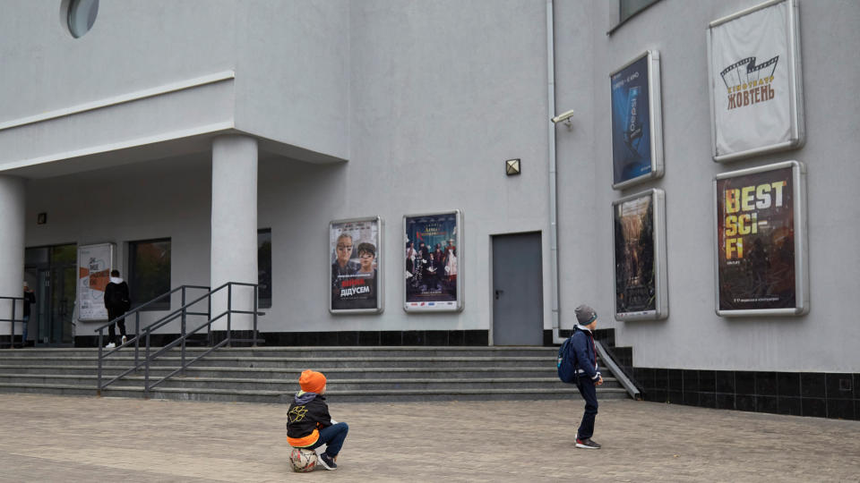Children outside a cinema in the Podil district on October 6, 2020, in Kyiv, Ukraine. - Credit: Pierre Crom/Getty Images