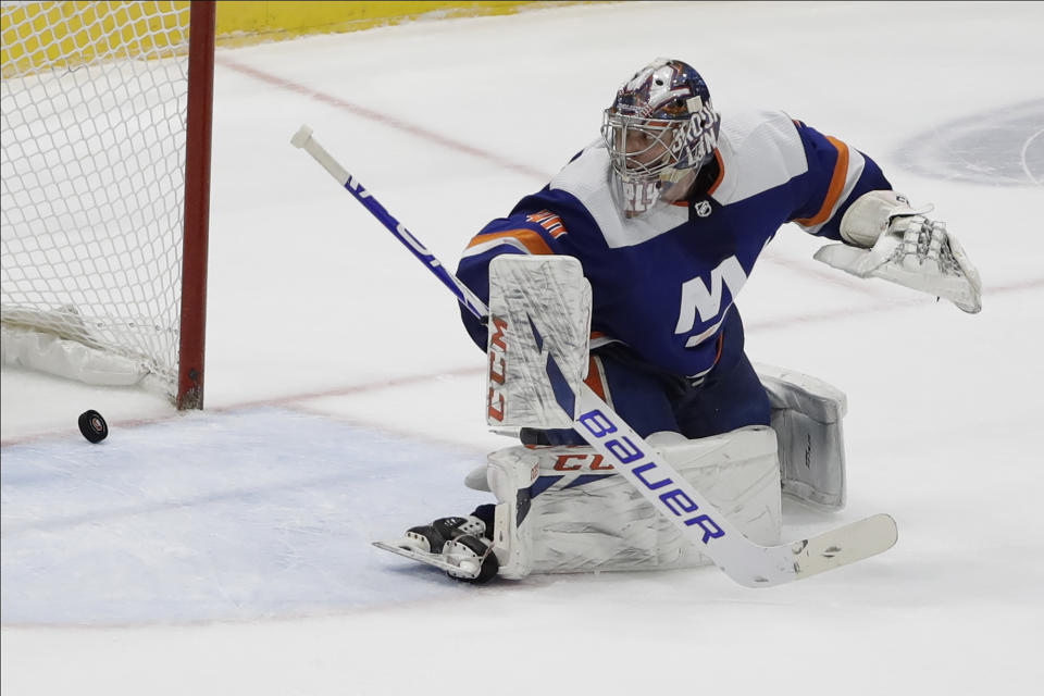 New York Islanders goaltender Semyon Varlamov (40) watches as the puck shot by Washington Capitals' Jakub Vrana (13) gets past him for a goal during the third period of an NHL hockey game Saturday, Jan. 18, 2020, in Uniondale, N.Y. The Capitals won 6-4. (AP Photo/Frank Franklin II)