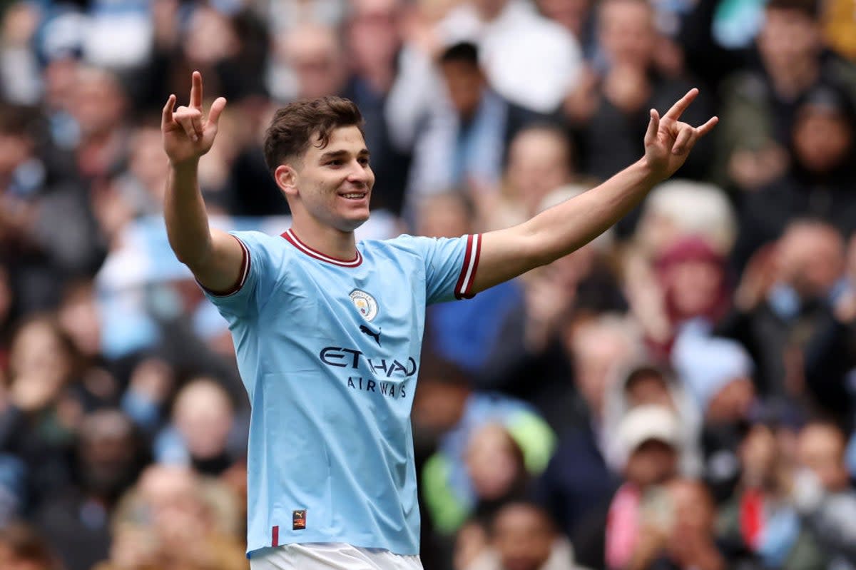 Alvarez celebrates after scoring City’s first goal against Liverpool  (Getty)