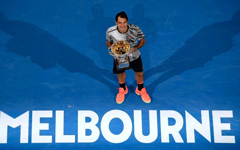 Roger Federer will defend his Australian Open title in Melbourne - AP