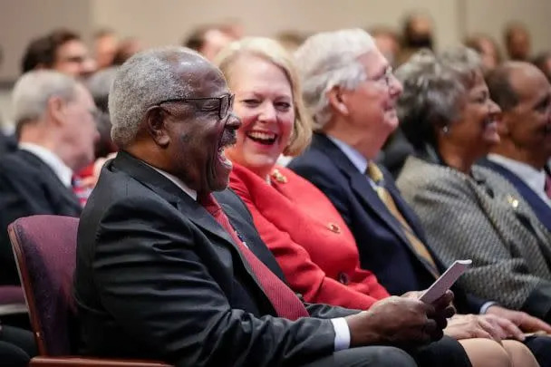 PHOTO: Supreme Court Justice Clarence Thomas sits with his wife Virginia Thomas while he waits to speak at the Heritage Foundation, Oct, 21, 2021, in Washington, D.C. (Drew Angerer/Getty Images)