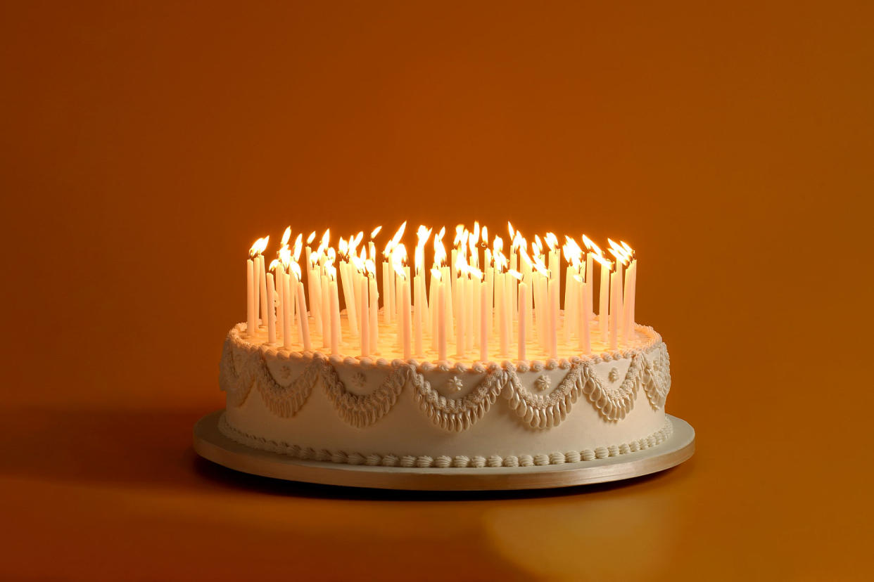 Birthday Cake With A Ton Of Candles Getty Images/Ziviani