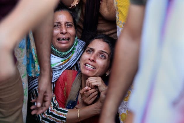 Aradhana, center, wife of Deepak Chand, a schoolteacher who was killed in Kashmir, mourns before the cremation in Jammu, India, on Oct. 8. Assailants fatally shot two schoolteachers in Indian-controlled Kashmir on Thursday in a sudden rise in targeted killings of civilians in the disputed region, police said. Authorities blamed militants fighting against Indian rule for the attack in the outskirts of Srinagar, the region’s main city. (Photo: Channi Anand via AP)