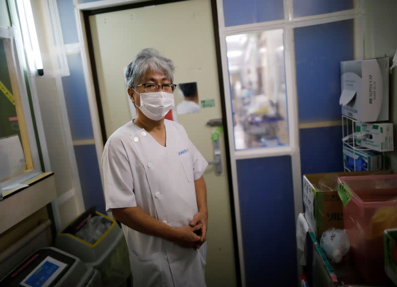 Dr. Shigeki Fujitani poses for a photo at the ICU for the coronavirus disease (COVID-19) patients at St. Marianna Medical University Hospital in Kawasaki, Japan
