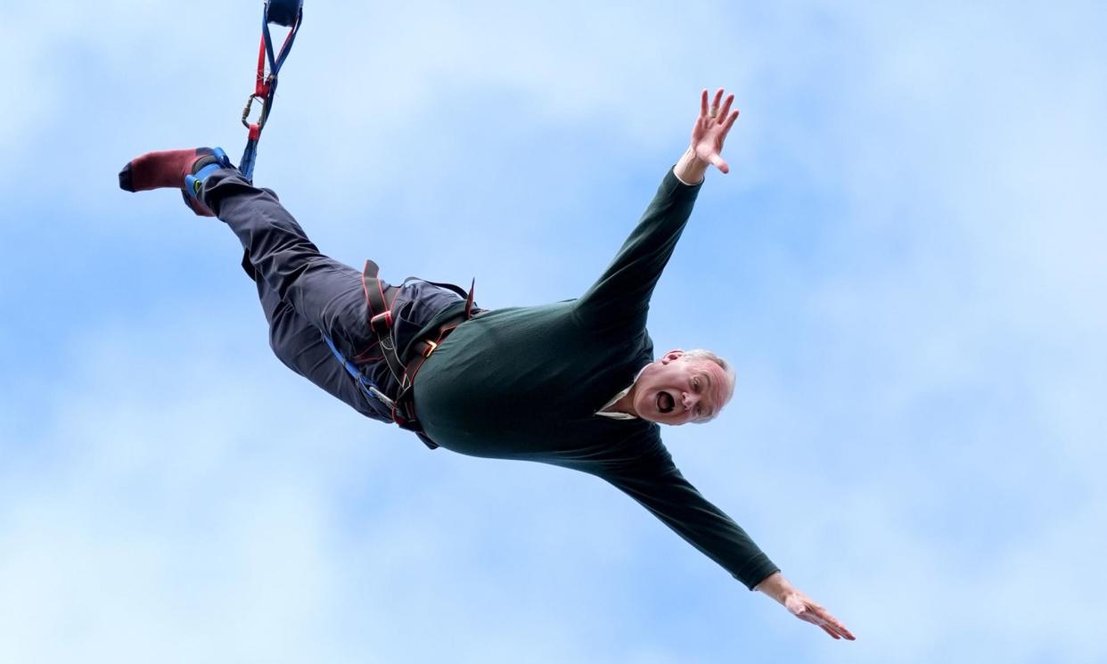 <span>Fall guy … the Liberal Democrat leader, Ed Davey, taking part in a bungee jump.</span><span>Photograph: Gareth Fuller/PA</span>