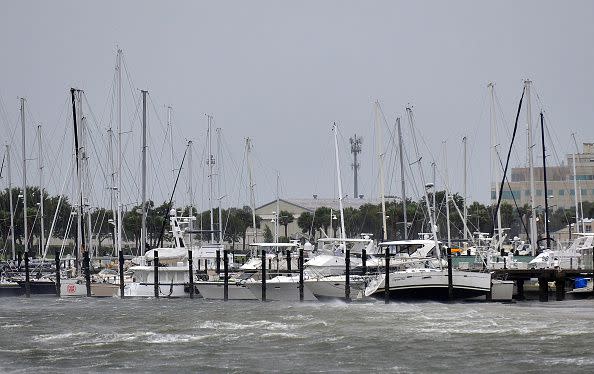 Wind gusts blow across boats in the St. Pete pier as the Hurricane Ian hits the Florida west cost on September 28, 2022, in St. Petersburg, Florida.